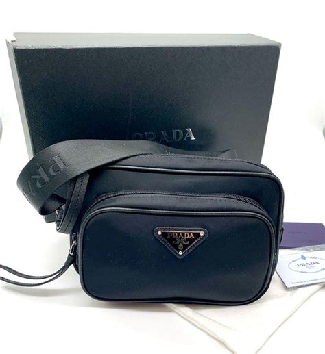 riñonera de renylon mujer Prada bolsas J82H818 negro.